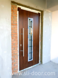 Двері Hörmann Thermo65 в мотиві 700 та кольорі Темний дуб (Dark Oak)