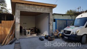 установка гаражних воріт Хьорман Реноматік монтаж гаражних воріт Чернівці